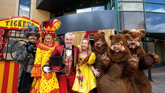 The cast of Goldilocks and the Three Bears posing outside the theatre